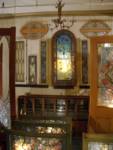When Mrs. Winchester died, she had $25,000 worth of Tiffany glass and other items in a store room. Now, everthing in the room is valued at over $2 million. Mrs. Winchester designed the webbed stained glass in the center of the picture herself. When Mrs. Winchester died, she had $25,000 worth of Tiffany glass and other items in a store room. Now, everthing in the room is valued at over $2 million. Mrs. Winchester designed the webbed stained glass in the center of the picture herself.