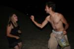 Thomas tossing Sarah a grape Thomas tossing Sarah a grape